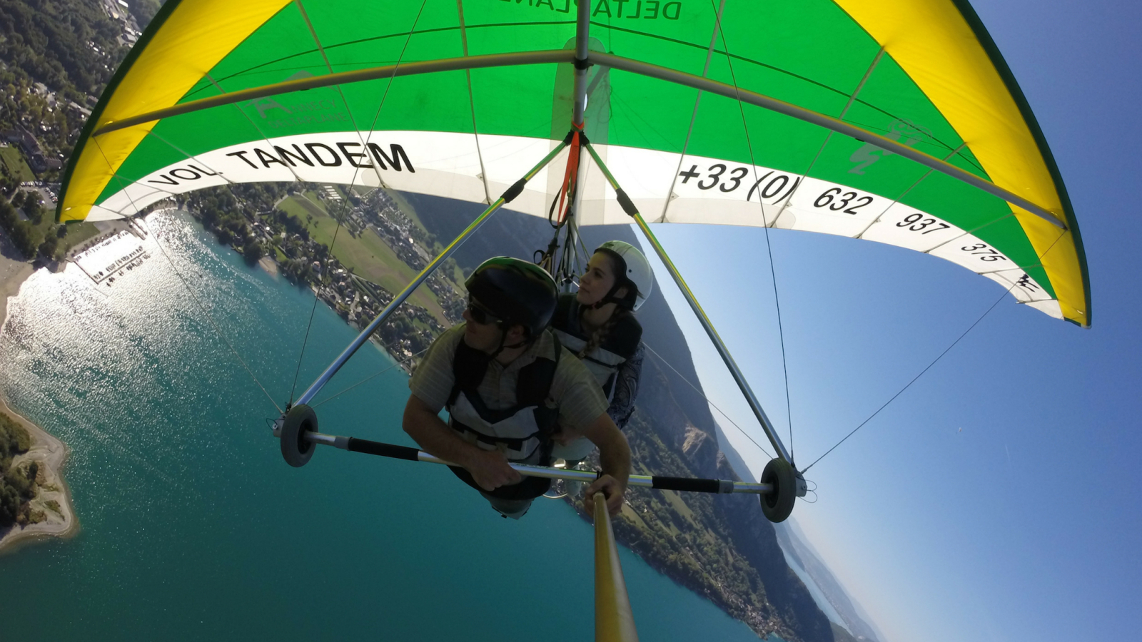 high performance hang gliding flight above lake Annecy