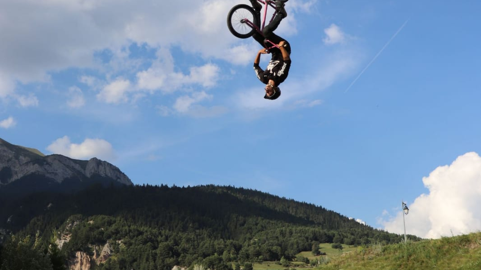 Mountain bike jump on the big air bag