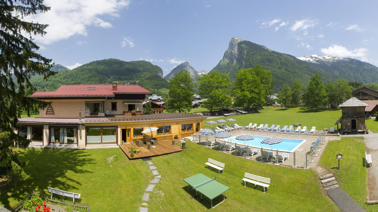 View of the accommodation and swimming pool from the garden