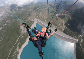 Tandem paragliding flight with Antipodes