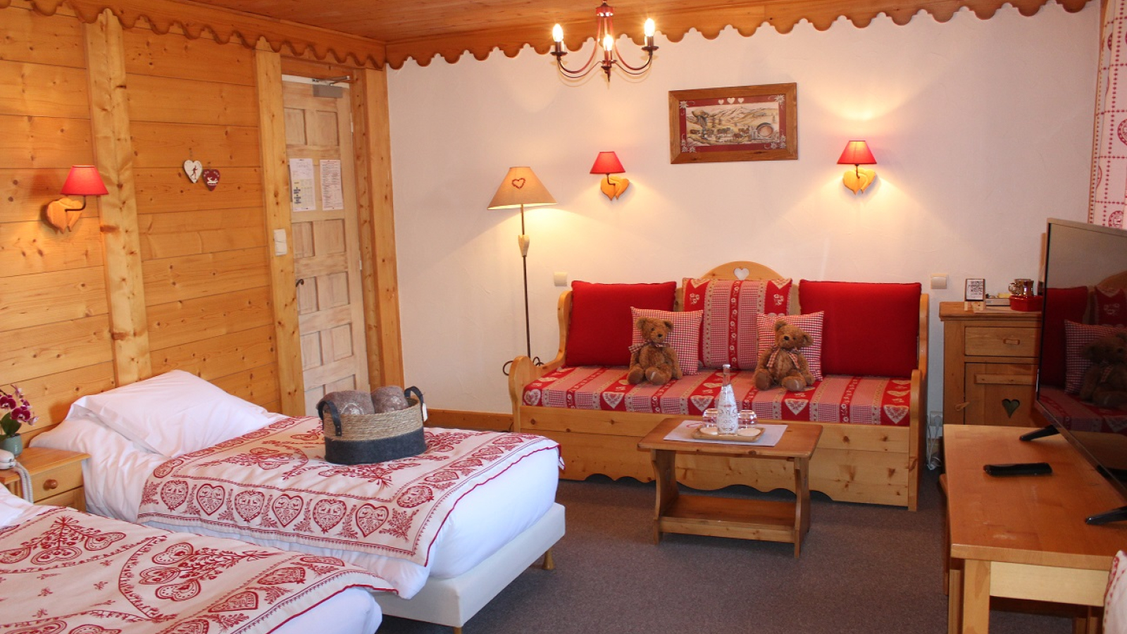 View of the red room with 2 beds