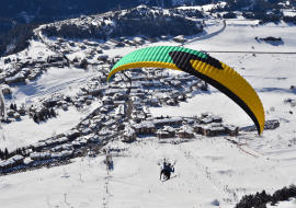 Paragliding flight over the village of Aussois