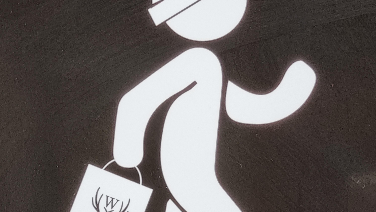 Pictogramme d'un homme avec un sac 'W' à la main