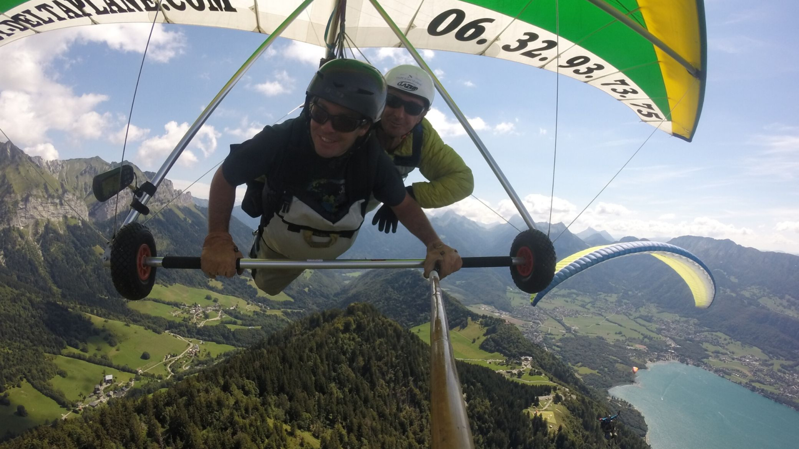 hang-gliding and paragliding flight above lake Annecy