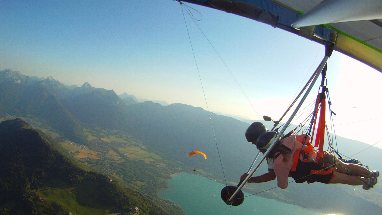 hang-gliding flight above sunny lake Annecy